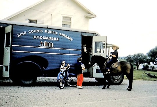 Children visiting King County Library System bookmobile, 1950s